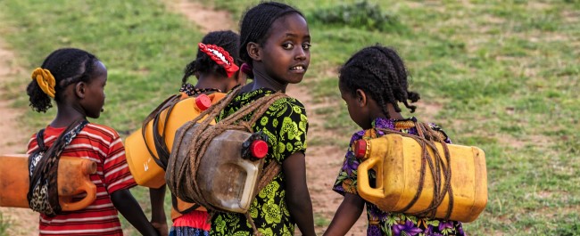 Girls collecting water Ethiopia